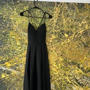 Little black light weight dress for evening or day attire. Never worn.
